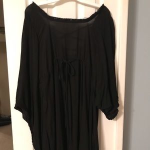Black gauzy batwing dress
